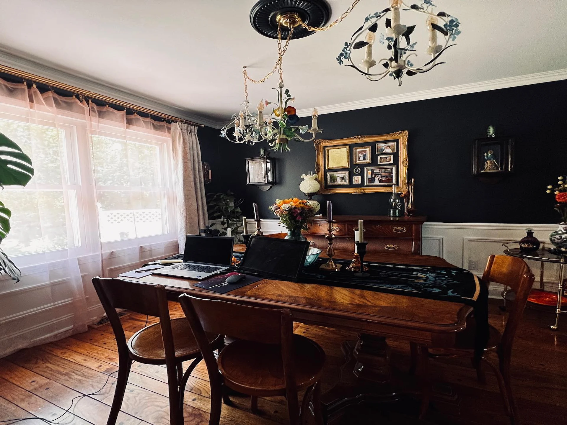 Finished dark dining room with crisp white trim