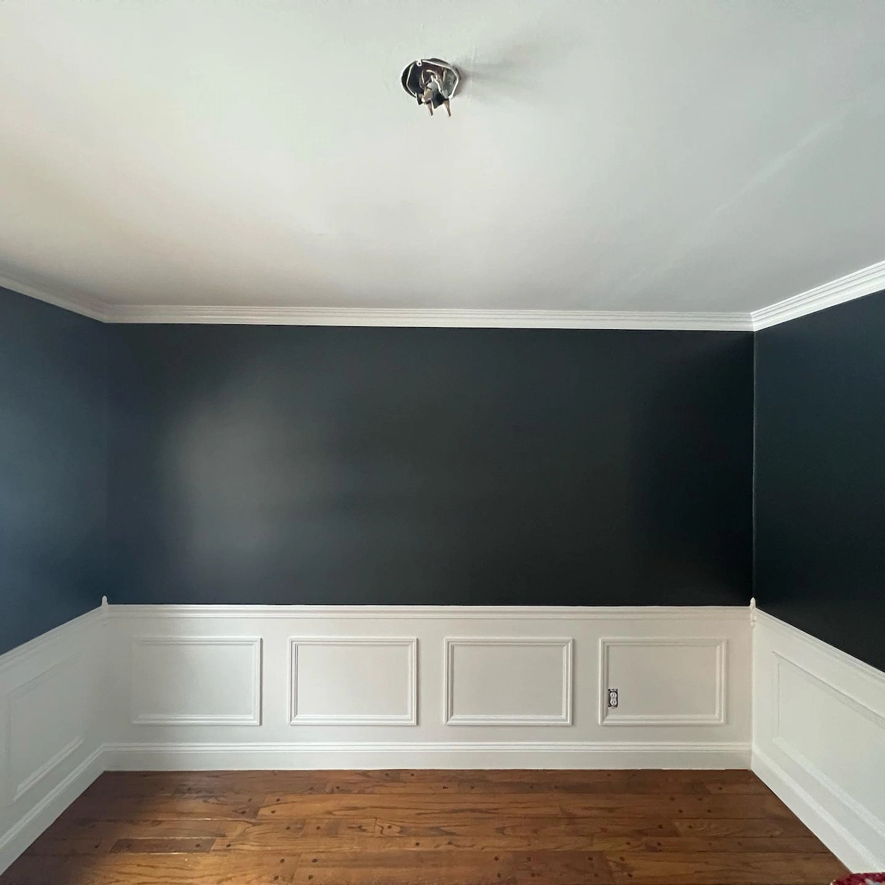 Mount Laurel dining room after a dark wall and white trim repaint